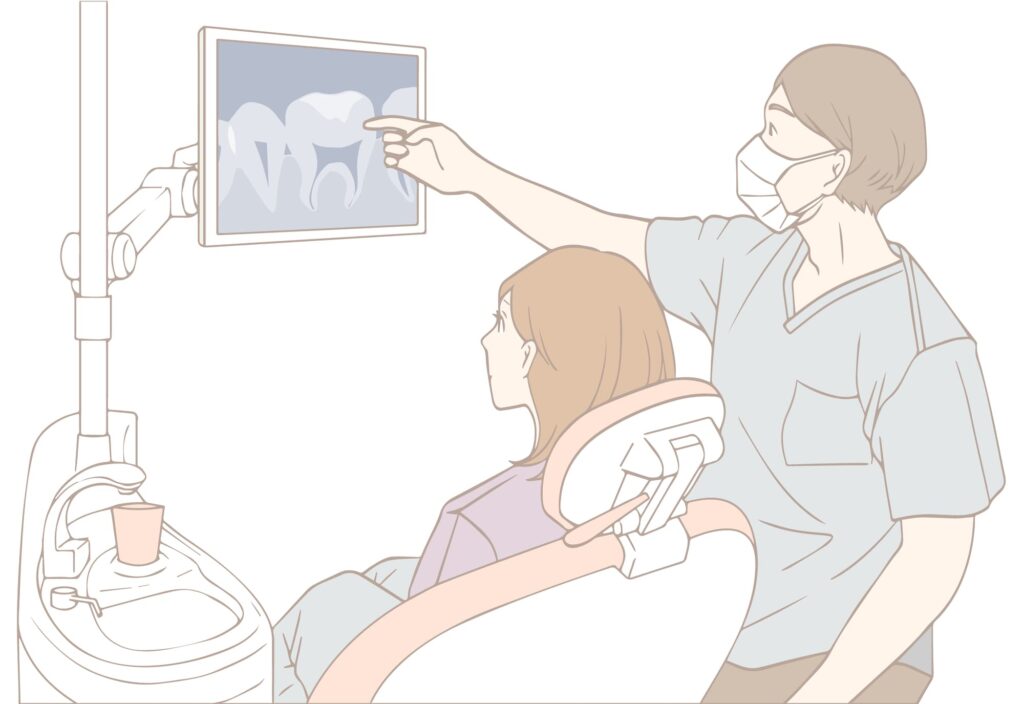 患者さんにレントゲンで説明する様子
